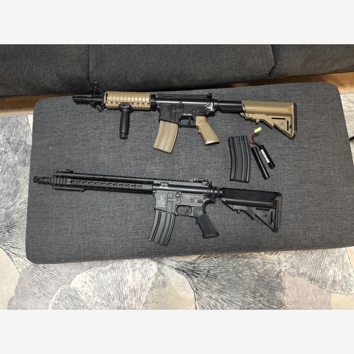 Kaksi airsoft asetta