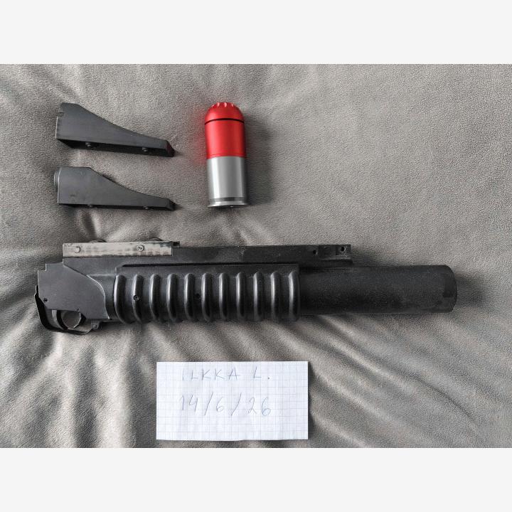 M203-heitin